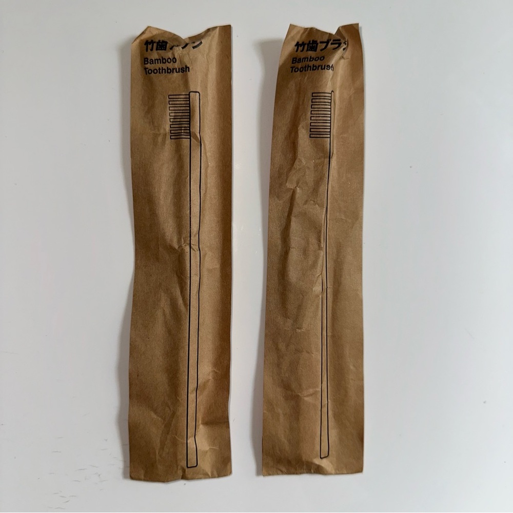 Set of 2 muji hotel bamboo toothbrushes NWT